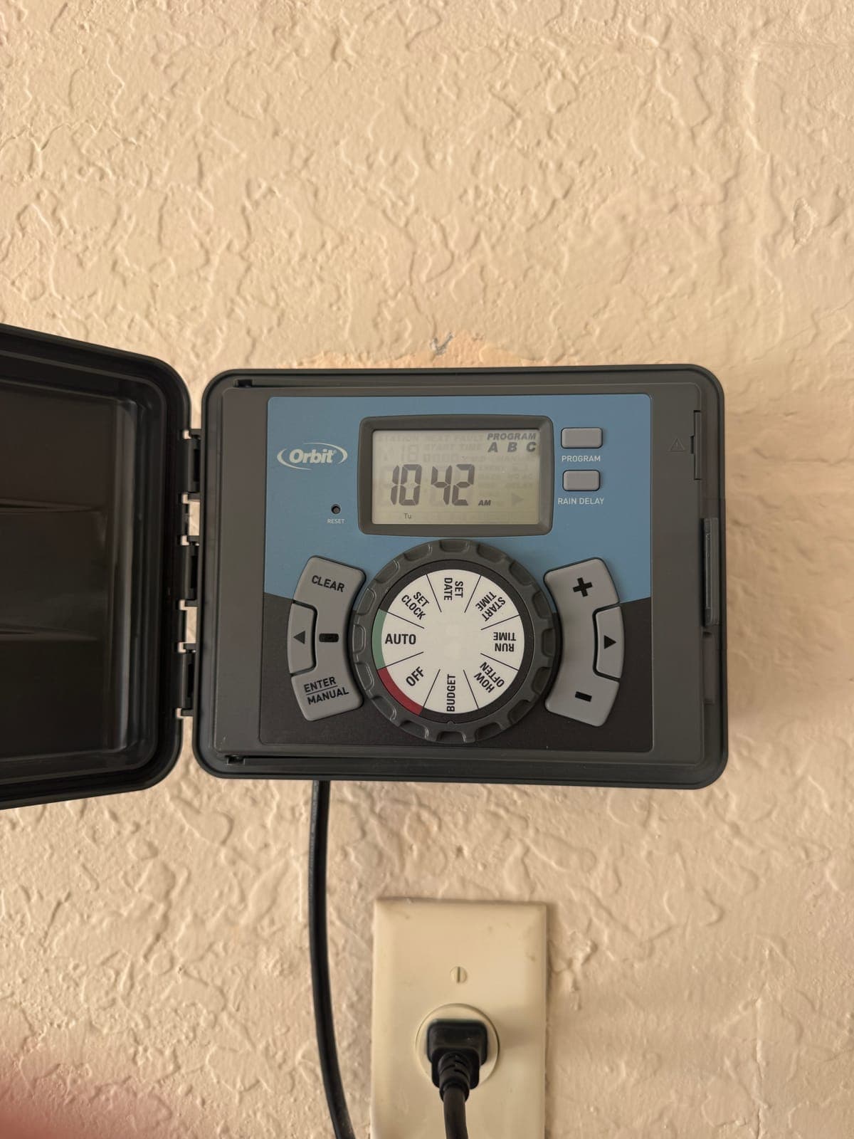Irrigation timer verified during a home watch visit